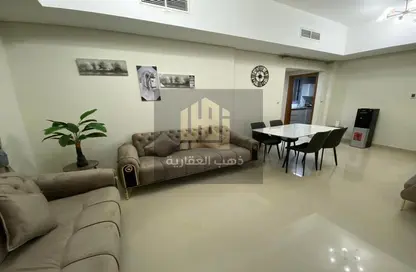 Living / Dining Room image for: Apartment - 1 Bedroom - 2 Bathrooms for rent in Nuaimia One Tower - Al Nuaimiya - Ajman, Image 1