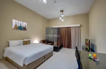 Room / Bedroom image for: Hotel  and  Hotel Apartment - 1 Bathroom for rent in City Stay Residences - Dubai Investment Park - Dubai, Image 1