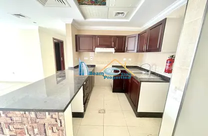 صورة لـ مطبخ شقة - 2 غرف نوم - 2 حمامات للايجار في 3 مدينة الواحة - مدينة الواحة - واحة السيليكون - دبي ، صورة رقم 1