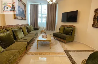 شقة - غرفة نوم - 2 حمامات للايجار في أورينت تاور 1 - أورينت تاور - البستان - عجمان