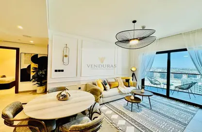 Living / Dining Room image for: Apartment - 1 Bedroom - 2 Bathrooms for rent in Waves Grande - Sobha Hartland - Mohammed Bin Rashid City - Dubai, Image 1