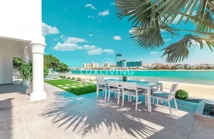 Villa - 7+ Bedrooms - 6 Bathrooms for rent in Garden Homes Frond O - Garden Homes - Palm Jumeirah - Dubai