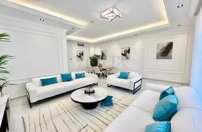 Living Room image for: Townhouse - 4 Bedrooms - 6 Bathrooms for sale in Westar Terrace Garden - Jumeirah Village Circle - Dubai, Image 1