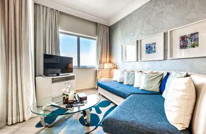 صورة لـ غرفة المعيشة شقة - غرفة نوم - 2 حمامات للبيع في ذا سيجنتشر - برج خليفة - دبي وسط المدينة - دبي ، صورة رقم 1