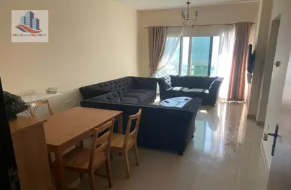 Living / Dining Room image for: Apartment - 1 Bedroom - 2 Bathrooms for rent in New Al Taawun Road - Al Taawun - Sharjah, Image 1