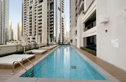 صورة لـ حوض سباحة شقة - غرفة نوم - 1 حمام للايجار في اكت تاورز - منطقة دار الأوبرا - دبي وسط المدينة - دبي ، صورة رقم 1