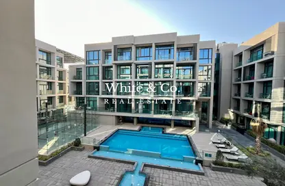 Pool image for: Apartment - 1 Bedroom - 2 Bathrooms for rent in Signature Livings - Jumeirah Village Circle - Dubai, Image 1