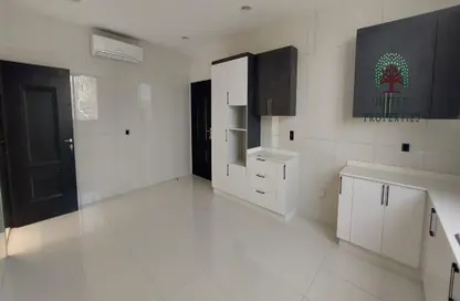 Kitchen image for: Villa - 5 Bedrooms - 6 Bathrooms for sale in Halwan - Sharjah, Image 1