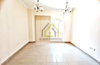 Empty Room image for: Apartment - 1 Bathroom for rent in Al Nada Tower - Al Nahda - Sharjah, Image 1