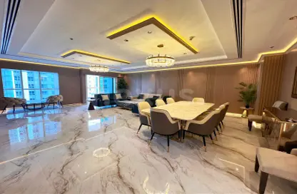 Living / Dining Room image for: Apartment - 4 Bedrooms - 6 Bathrooms for rent in Elite Residence - Dubai Marina - Dubai, Image 1