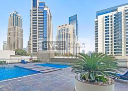 Pool image for: Apartment - 1 bedroom - 1 bathroom for sale in 8 Boulevard Walk - Mohammad Bin Rashid Boulevard - Downtown Dubai - Dubai, Image 1