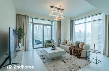 Living Room image for: Apartment - 3 Bedrooms - 3 Bathrooms for rent in Marina Vista - EMAAR Beachfront - Dubai Harbour - Dubai, Image 1