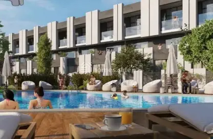 Townhouse - 2 Bedrooms - 2 Bathrooms for sale in Reportage Village 1 - Dubai Land - Dubai