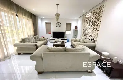 Living Room image for: Townhouse - 5 Bedrooms - 4 Bathrooms for rent in Bloomingdale Townhouses - Bloomingdale - Dubai Sports City - Dubai, Image 1