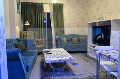 شقة - 2 غرف نوم - 2 حمامات للايجار في برج منازل 2 - شارع التعاون - التعاون - الشارقة