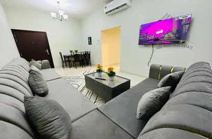 Living / Dining Room image for: Apartment - 2 Bedrooms - 2 Bathrooms for rent in Corniche Ajman - Ajman, Image 1