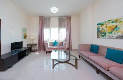 Living Room image for: Apartment - 1 Bedroom - 2 Bathrooms for rent in Suburbia Tower 1 - Suburbia - Downtown Jebel Ali - Dubai, Image 1