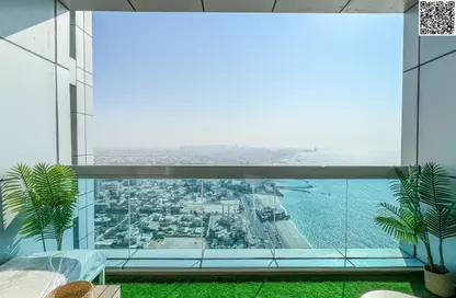 Apartment - 2 Bedrooms - 2 Bathrooms for sale in Corniche Tower - Ajman Corniche Road - Ajman