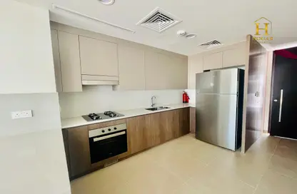 Kitchen image for: Townhouse - 3 Bedrooms - 4 Bathrooms for rent in Elan - Tilal Al Ghaf - Dubai, Image 1