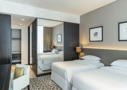 صورةغرفة- غرفة النوم لـ: شقة - 2 غرف نوم - 3 حمامات للكراء في فندق شيراتون الكبير - شارع الشيخ زايد - دبي, صورة 1
