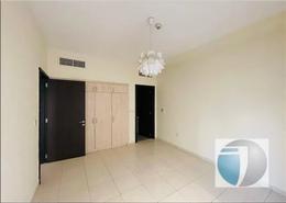 Empty Room image for: Apartment - 1 bedroom - 2 bathrooms for rent in Riviera Dreams - International City - Dubai, Image 1