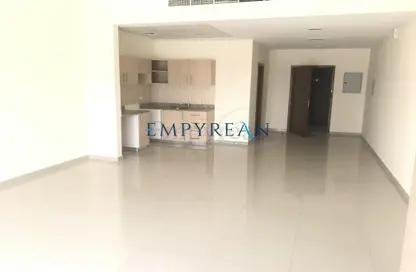 Empty Room image for: Apartment - 1 Bathroom for sale in Madison Residences - Majan - Dubai, Image 1