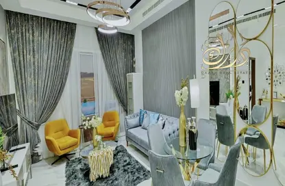 صورة لـ غرفة المعيشة شقة - 3 غرف نوم - 4 حمامات للبيع في أوبالز باي دانوب - ارجان - دبي ، صورة رقم 1