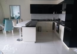 صورةمطبخ لـ: شقة - 2 غرف نوم - 3 حمامات للكراء في داماك ميزون شارع مول - دبي وسط المدينة - دبي, صورة 1