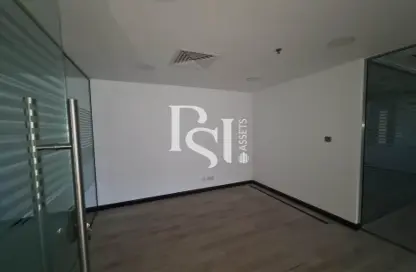 Empty Room image for: Office Space - Studio - 2 Bathrooms for rent in Al Ghaith Tower - Hamdan Street - Abu Dhabi, Image 1