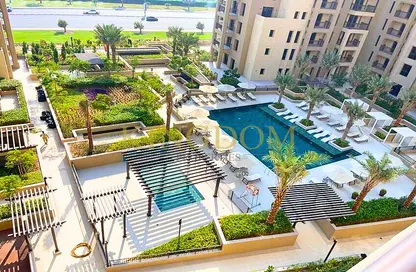 Pool image for: Apartment - 1 Bedroom - 1 Bathroom for rent in Asayel - Madinat Jumeirah Living - Umm Suqeim - Dubai, Image 1