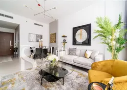 Living / Dining Room image for: Apartment - 1 Bedroom - 2 Bathrooms for sale in Prime Views by Prescott - Meydan Avenue - Meydan - Dubai, Image 1