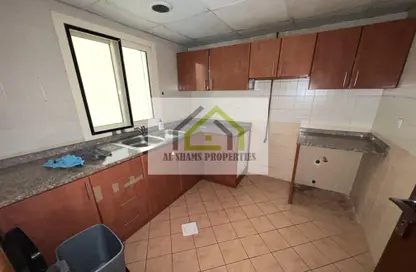 Kitchen image for: Apartment - 2 Bedrooms - 2 Bathrooms for rent in Muwaileh Commercial - Sharjah, Image 1
