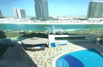 Pool image for: Apartment - 1 Bathroom for sale in Hydra Avenue Towers - City Of Lights - Al Reem Island - Abu Dhabi, Image 1
