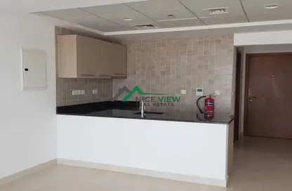 Kitchen image for: Apartment - 1 Bathroom for sale in Ansam 2 - Ansam - Yas Island - Abu Dhabi, Image 1
