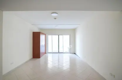 Empty Room image for: Apartment - 1 Bathroom for sale in The Crescent B - The Crescent - Dubai Production City (IMPZ) - Dubai, Image 1