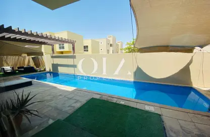 Pool image for: Villa - 4 Bedrooms - 6 Bathrooms for sale in Khannour Community - Al Raha Gardens - Abu Dhabi, Image 1