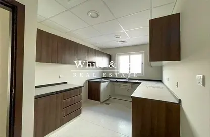 Kitchen image for: Villa - 3 Bedrooms - 3 Bathrooms for rent in Trixis - The Roots DAMAC Hills 2 - Damac Hills 2 - Dubai, Image 1