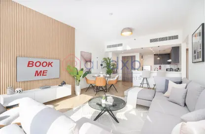 Living / Dining Room image for: Apartment - 1 Bedroom - 2 Bathrooms for rent in 1 Residences - Wasl1 - Al Kifaf - Dubai, Image 1