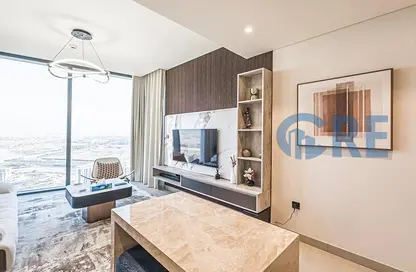 Living Room image for: Apartment - 1 Bedroom - 1 Bathroom for sale in Sobha Hartland Waves - Sobha Hartland - Mohammed Bin Rashid City - Dubai, Image 1
