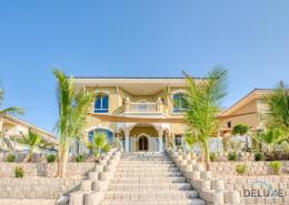 Outdoor House image for: Villa - 6 bedrooms - 6 bathrooms for rent in Garden Homes Frond E - Garden Homes - Palm Jumeirah - Dubai, Image 1