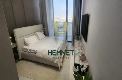 Room / Bedroom image for: Apartment - 1 Bedroom - 1 Bathroom for sale in Amal Tower - Dubai Sports City - Dubai, Image 1