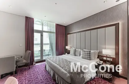 Apartment - Studio - 1 Bathroom for rent in Royal Continental Suites - Business Bay - Dubai