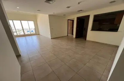 Empty Room image for: Apartment - 2 Bedrooms - 2 Bathrooms for rent in Venetian - Canal Residence - Dubai Sports City - Dubai, Image 1