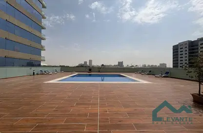 Apartment - Studio - 1 Bathroom for rent in Silicon Gates 4 - Silicon Gates - Dubai Silicon Oasis - Dubai