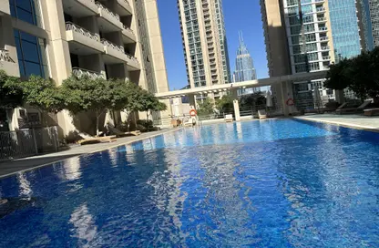 صورة لـ حوض سباحة شقة - 1 حمام للبيع في بوليفارد سنترال بوديوم - أبراج بوليفارد سنترال - دبي وسط المدينة - دبي ، صورة رقم 1