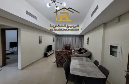 Dining Room image for: Apartment - 1 Bedroom - 1 Bathroom for sale in Nuaimia One Tower - Al Nuaimiya - Ajman, Image 1