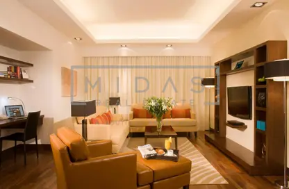 صورة لـ غرفة المعيشة النزل و الشقق الفندقية - 2 غرف نوم - 3 حمامات للايجار في مدينة دبي للانترنت - دبي ، صورة رقم 1