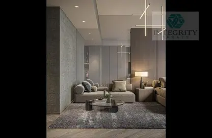 Living Room image for: Apartment - 1 Bathroom for sale in The Central Downtown - Arjan - Dubai, Image 1