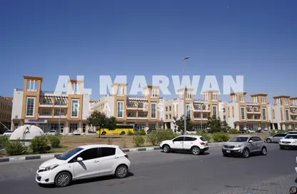Outdoor Building image for: Apartment - 2 Bedrooms - 3 Bathrooms for rent in The Grand Avenue - Al Nasreya - Sharjah, Image 1