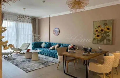 Living / Dining Room image for: Apartment - 2 Bedrooms - 4 Bathrooms for sale in Qamar 6 - Madinat Badr - Al Muhaisnah - Dubai, Image 1